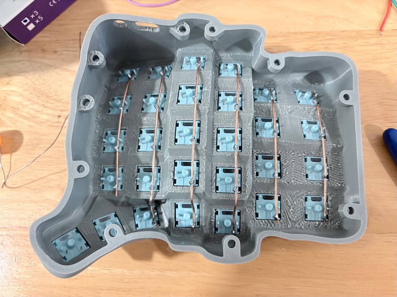 Wiring up the columns with bare copper wire